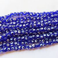Vente en gros de perles de verre turques à triple œil maléfique en cristal pour la fabrication de bijoux et décoration de la maison