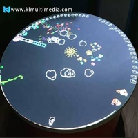 Mesa de juegos interactiva 3D redonda para niños, máquina digital eléctrica todo en uno para juegos de proyección de vídeo gestual en restaurante