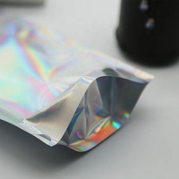 Sacs holographiques en aluminium transparent avec fermeture éclair personnalisée, refermables, en film laser, en plastique Mylar, pochettes verticales à fermeture éclair
