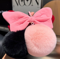 Vente en gros de porte-clés en peluche douce et moelleuse avec un grand nœud en fourrure, pompon en peluche, dessin animé d'Halloween, pendentif de sac, cœur