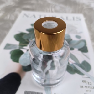 Prezzo a buon mercato 30ml vetro Reed diffusore bottiglia di vetro vuota bottiglia con oro nero tappo d'argento per la casa Hotel campione