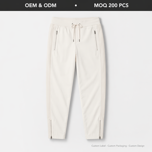 <span class=keywords><strong>Pantaloni</strong></span> Sportivi da Donna Personalizzati OEM a Vita Alta, Stile Lusso, <span class=keywords><strong>con</strong></span> Striscia Laterale Bicolore, Apertura <span class=keywords><strong>con</strong></span> Zip <span class=keywords><strong>alla</strong></span> <span class=keywords><strong>Caviglia</strong></span>, in Misto Nylon Tecnico - Product Image 1