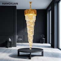 Lustre moderne en fer doré et cristal, design spirale large, hauteur réglable, garantie 5 ans, installation facile pour éclairage central