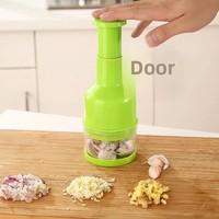 Handmatige knoflookhakker, mini handmatige chili-knoflook-wortelenpers, ui-groentesnijder, handmatige knoflookknijper