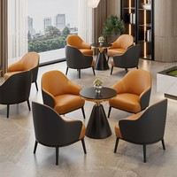 Fauteuil de salle à manger individuel en cuir, style minimaliste de luxe, pour restaurant commercial, avec table en pierre frittée pour restaurant buffet