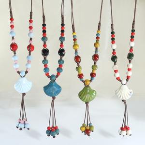 Женское колье с керамическими бусинами - Product Image 1