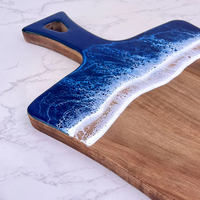 Nouveaux produits Noël 2026 : Planches à découper multifonctionnelles en résine et bois d'acacia avec poignée design vague océanique pour la cuisine