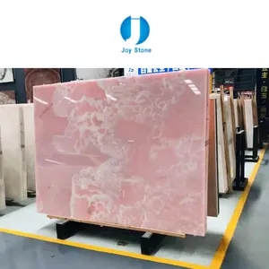 Von hinten beleuchtete rosa Onyx-Textur-Marmorplatten Wand verkleidung fliesen