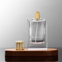 Vente en gros de flacons de parfum en verre rectangulaires plats avec pulvérisateur à pompe, plaque personnalisée avec marque et logo, 100 ml