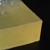 Adhésif thermofusible PSA en caoutchouc résistant aux basses températures, bloc jaune, faible odeur, pour le revêtement des étiquettes en plastique