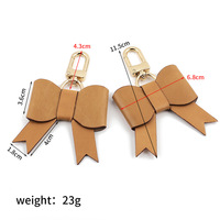 BB162 11.5*6.8cm Gantungan Kunci Kulit Nabati Bentuk Pita, Liontin Tas, Aksesoris Mewah, Gantungan Kunci Fashion, Perlengkapan Kerajinan Kulit DIY