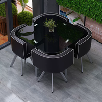 Ensemble table basse et chaises en verre trempé avec structure métallique, style moderne et minimaliste, pour réceptions, espaces décontractés, salons de thé et salons de beauté