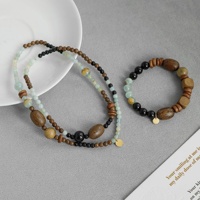 Nouvel ensemble collier et bracelet multi-tresors en laiton, design de niche haut de gamme, style ethnique vintage, luxe léger pour femme, pour la vie quotidienne