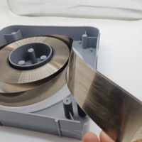 Lame de doctoring en céramique dorée longue durée 10-60mm*0.15/0.2mm de largeur en rouleau pour impression flexographique et gravure, revêtement personnalisé OEM ODM