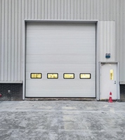 Porte de garage industrielle coulissante verticale automatique en acier au design postmoderne personnalisé, à levage thermique