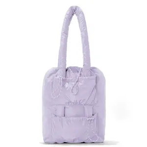 Puffy Tote meets recycled drawstring bag Lightweight and easy to clean Extra wide main opening for easy access drawstring bag