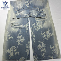 Tissu en denim imprimé de motifs de fleurs blanches personnalisées de 11.3oz tissage sergé bleu doux pour filles et garçons vêtements tissu en jean doux
