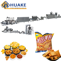 Industriële automatische lijn voor het verwerken van gefrituurde gepofte snacks, continu frituur- en extrusieapparatuur voor snacks