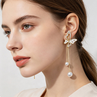 Boucles d'oreilles pendantes tendance en alliage avec fleurs, perles simulées, style bohème, longues, pour femme, bijoux de fête et de vacances