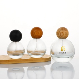 Bomba de fragancia personalizada <span class=keywords><strong>Spray</strong></span> 30ml 50ml 75ml 100mL Botella de perfume de vidrio con forma de bola con tapa de madera - Product Image 1