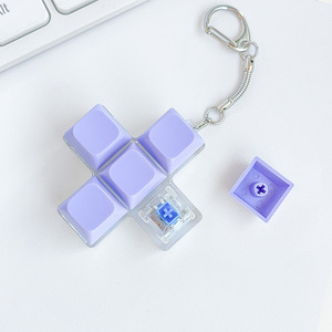 Nouveau design porte-clés en plastique à cinq touches croisées avec fonction anti-stress lumineuse et décompression, jouet sensoriel - Product Image 4
