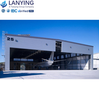 Hangar industriel moderne à grande portée en acier avec toiture et panneaux muraux isolés pour utilisation en hangar