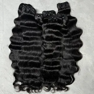 Vente en gros d'extensions de faisceaux de cheveux humains ondulés naturels vietnamiens bruts non transformés