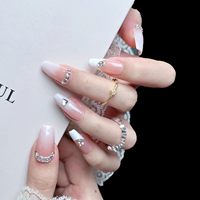 Prix d'usine, vente en gros, faux ongles de luxe en ABS, 24 pièces, faits à la main, forme cercueil longue, à presser, avec strass