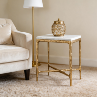 Table basse moderne en métal forgé avec plateau en marbre et base en X pour la décoration de la maison