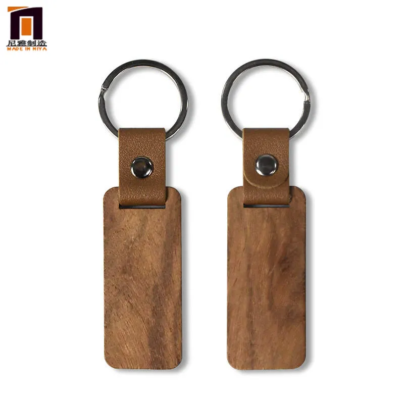 Vente en gros de porte-clés à sublimation Accessoires en bois Porte-clés en bois pour la gravure de cuir Porte-clés personnalisé en bois
