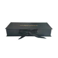 Boîte cadeau rigide magnétique noire de qualité supérieure avec pelliculage brillant, impression dorée et nœud en ruban pour vêtements