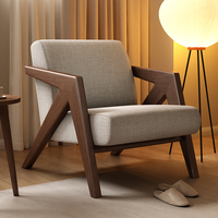 Fauteuil de salon moderne de luxe nordique en bois massif, confortable et élégant, avec design décoratif capitonné pour salon et chambre à coucher