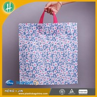 Sacs de courses en plastique réutilisables avec motifs colorés pour les supermarchés et la vente au détail