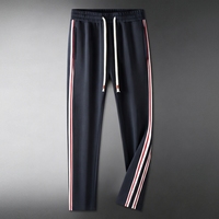 Ensemble de survêtement sport décontracté brodé haut de gamme pour hommes et femmes, en polyester tricoté à séchage rapide, deux pièces, motif uni, collection automne
