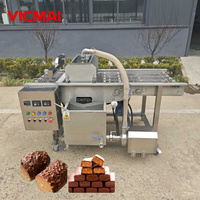 Machine à enrober le chocolat avec système de tempérage, pour une enrobage uniforme et automatique des gaufrettes, bonbons et biscuits