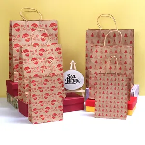Prezzo di fabbrica all'ingrosso imballaggio Shopping regalo di natale sacchetto di carta Kraft stampato personalizzato