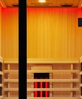 Sauna infrarouge compact avec luminothérapie rouge, porte panoramique en verre et intérieur en bois naturel
