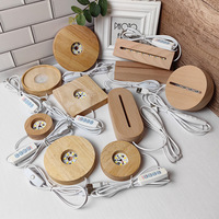 Support de lampe de table LED personnalisé en gros, présentoir en bois circulaire en cristal avec design gravé en couleur chaude, recharge USB