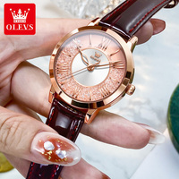 OLEVS 5539 logotipo personalizado OEM lujo Rosa moda señoras mujeres esqueleto transparente Oem impermeable reloj de cuarzo para dama