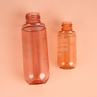 Flacons pulvérisateurs cosmétiques en forme de capsule 30ml 90ml, contenants rechargeables en PET à fine brume avec pompe pulvérisatrice