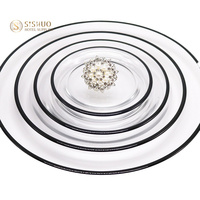 Assiette de présentation ronde de luxe en verre transparent avec bord doré pour mariages