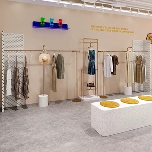 Progettazione su ordinazione del negozio della decorazione del negozio dello scaffale di vestiti del banco di mostra dell'abbigliamento della parete dell'oro per il negozio - Product Image 3