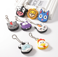 Cadeaux promotionnels personnalisés en gros 3D mignon Anime dessin animé lumineux LED en silicone PVC souple étui à clés de voiture lampe de poche porte-clés