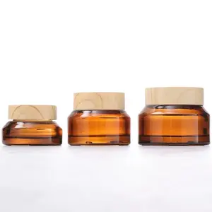 Wholesale Cheap Price Empty Round Cosmetic Amber Glossy Glass Cream Jar 15g 30g 50gl with PP Screw Bamboo Lids