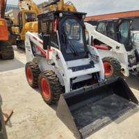 Chargeuse compacte verticale d'occasion, capacité de charge nominale de 850 kg+, stabilité améliorée pour la manutention de matériaux à grande portée