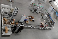 Ligne d'emballage pour produits : Huile moteur, Huile essence, Bouteilles de gaz en plastique, Bouteilles aérosols, Boîtes en carton, Emballeuses de cartons
