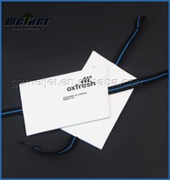 Étiquettes à suspendre en métal de luxe personnalisées pour vêtements, étiquettes de sécurité de douche avec logo coloré à impression convexe concave durable pour chaussures