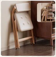 Fauteuil pliant avec dossier et assise rembourrés, revêtement en cuir PU, structure en acier carbone, finition grain de noyer, empilable, style rétro pour salle à manger