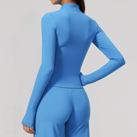 Veste de yoga OEM à fermeture éclair dorée, séchage rapide, col montant, coupe ajustée, haute élasticité, respirante, pour femme, idéale pour la course et la gym