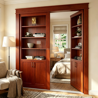 Élégante bibliothèque blanche double avec porte dissimulée, armoires de rangement fermées, porte secrète pour chambre à coucher